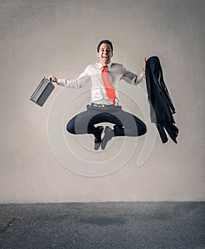 Happy businessman jumping