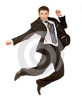 Happy businessman jumping in air