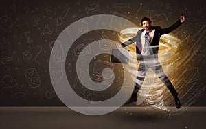 Happy businessman jumping in tornado concept