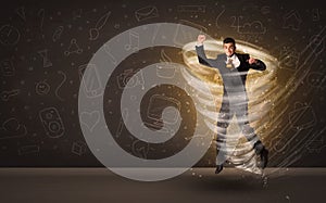 Happy businessman jumping in tornado concept