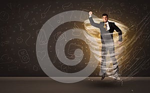 Happy businessman jumping in tornado concept