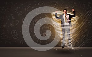 Happy businessman jumping in tornado concept