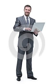 Happy businessman with a laptop.