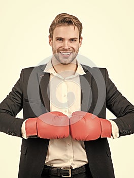 Happy businessman man hold boxing gloves together ready to fight isolated on white, fighting