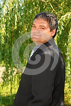 Happy businessman outdoor in summer