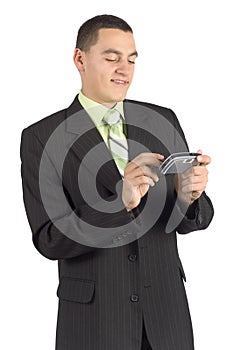 Happy businessman with palmtop / mobile