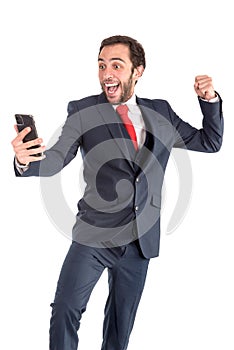 Happy businessman with phone