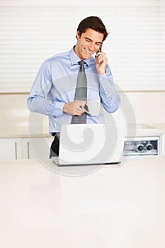 Happy businessman, phone call and coffee for conversation or communication in kitchen at home. Man or employee smile and