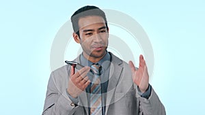 Happy businessman, phone call and speaker in conversation or consulting against a studio background. Asian man talking
