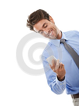 Happy businessman, phone and social media for communication against a white studio background. Man or employee smile on
