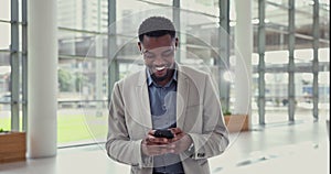 Happy businessman, phone and walking at office in social media, communication or networking. Black man or employee