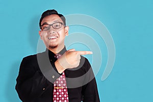 Happy Businessman Pointing To The Side