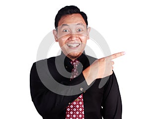 Happy Businessman Pointing To The Side