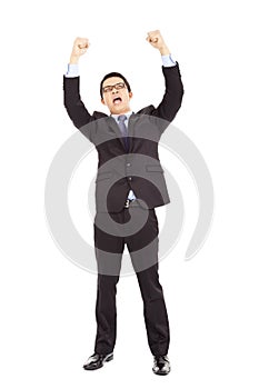 Happy businessman raised up and shout loudly