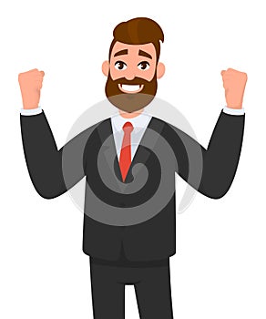 Happy businessman is raising hands in fists and happiness and success. Positive human emotion facial expression.