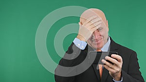 Happy Businessman Smile and Gesticulate Reading a Cell Phone Text