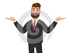 Happy businessman spreading his hands to the sides. Man pointing away and showing or presenting something. Man pointing hands.