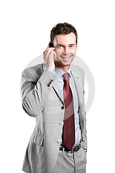 Happy businessman talking on mobile