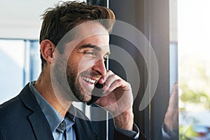 Happy, businessman and thinking with phone call for conversation, communication or proposal by window at office. Man or