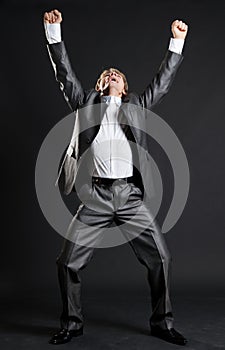 Happy businessman is very glad photo