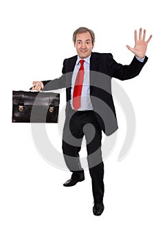 Happy businessman waving