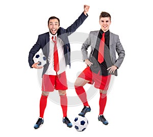 Happy businessmen with footballs
