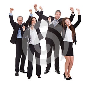 Happy businesspeople jumping in joy