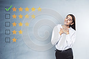 Happy businesswoman with 5 star rating on concrete wall background. Customer service and excellent feedback