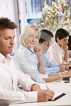 Happy businesswoman in business meeting