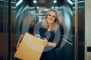 Happy Businesswoman Carrying a Delivery Box to her Office