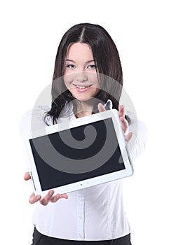 Happy businesswoman holding a tablet with copy space