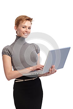 Happy businesswoman with laptop