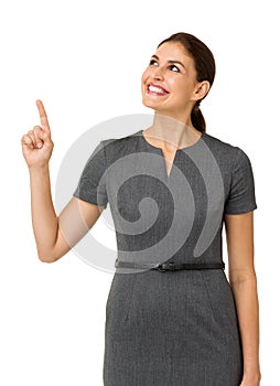 Happy Businesswoman Pointing Upwards