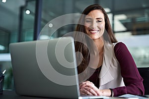 Happy businesswoman and portrait with laptop for work, email and connection. Female employee, computer and technology