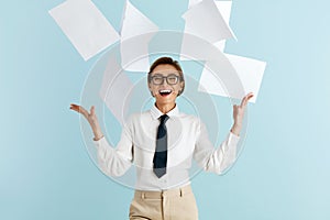 Happy Businesswoman Rejoicing Isolated. Woman With Pile of Papers Flying on Air