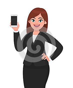 Happy businesswoman showing the blank smartphone. Telecommunication, technology, mobile apps concept.