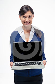 Happy businesswoman showing laptop computer screen