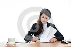 Happy Businesswoman Sitting At Office Desk