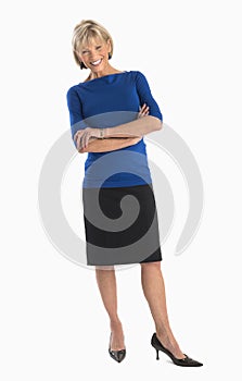 Happy Businesswoman Standing Arms Crossed Over White Background