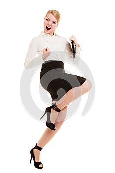 Happy businesswoman with success hand gesture