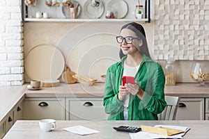 Happy Businesswoman Using Mobile Phone at Home Office. Cheerful smiling business woman