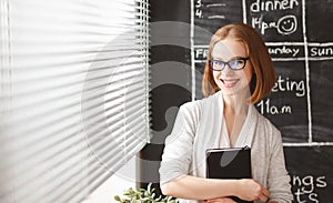 Happy businesswoman woman at school board with schedule planning