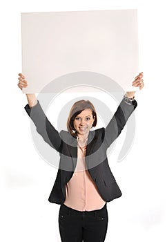 Happy busy business woman holding cardboard sign as copy space