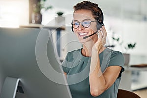 Happy, call center and computer, woman and headphones at desk, customer support or sales for telemarketing company