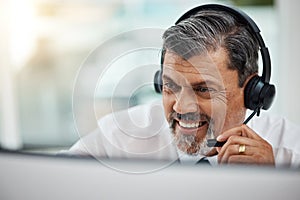 Happy, call center and mature man listening for business, customer service or support. Contact us, telemarketing and