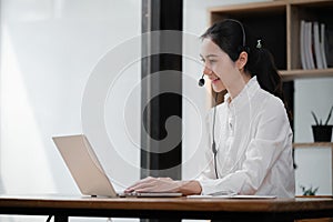 Happy call center woman consulting customer for customer support, help or telemarketing sales. Sales advisor, CRM girl