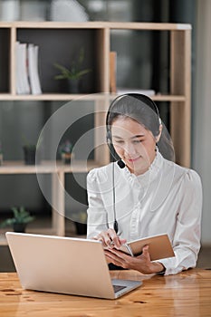 Happy call center woman consulting customer for customer support, help or telemarketing sales. Sales advisor, CRM girl