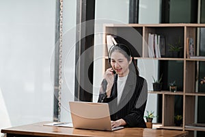 Happy call center woman consulting customer for customer support, help or telemarketing sales. Sales advisor, CRM girl
