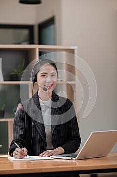 Happy call center woman consulting customer for customer support, help or telemarketing sales. Sales advisor, CRM girl