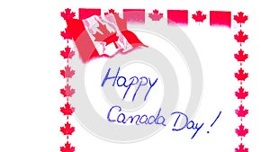 Happy Canada day handwriting on paper with Canada flag. Writing text on memo post reminder. Bucharest, Romania, 2020